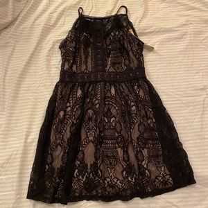 Francesca’s black lace dress